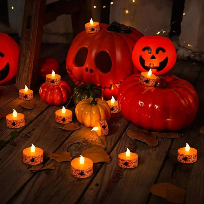Halloween Flamel Votive Candles Battery Operated with 6H Timer 12 Pack Spider Cobweb Decal LED Flickering Pumpkin Tea Lights Ca
